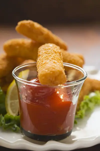Fish finger with ketchup — Stock Photo, Image