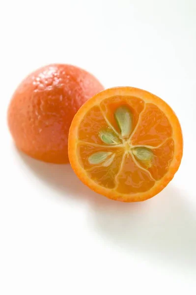Halved orange with pips — Stock Photo, Image