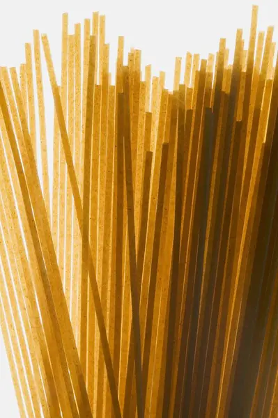 Bunch of wholemeal linguine — Stock Photo, Image