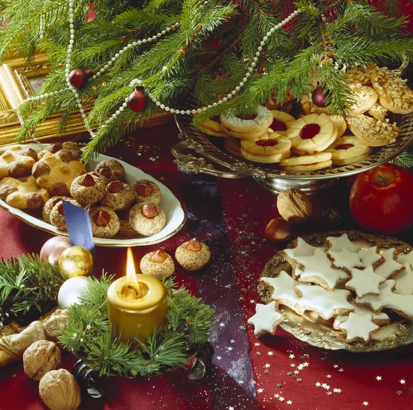 Assorted biscuits on plates — Stock Photo, Image