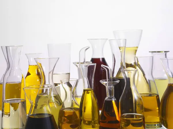 Various Types Oil Different Glass Vessels — Stock Photo, Image
