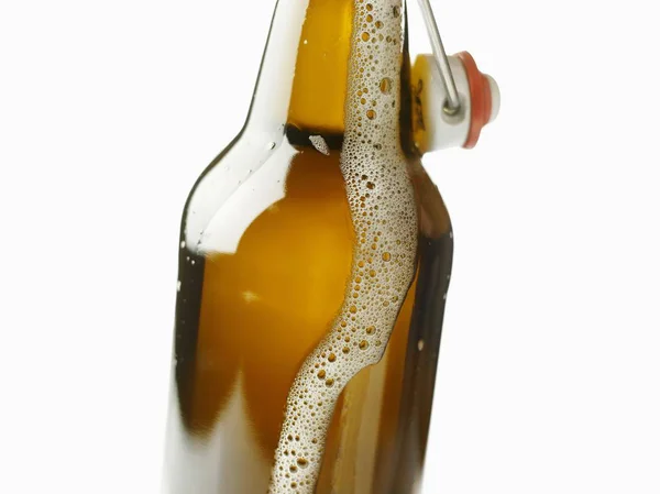 Flip-top bottle with beer — Stock Photo, Image