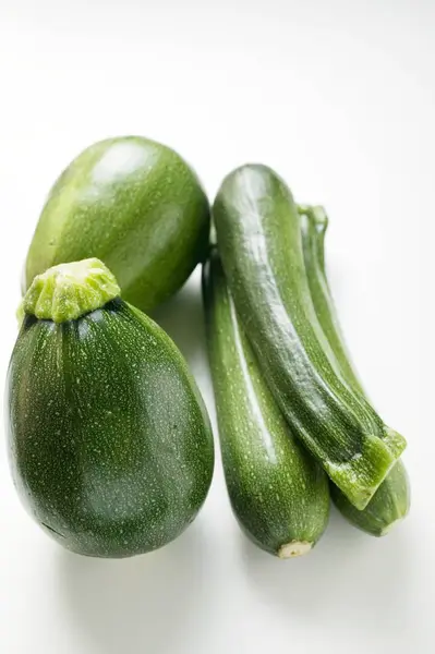 Green Round and long courgettes — Stock Photo, Image