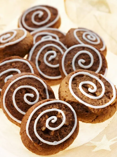 Pepper nut biscuits decorated with icing sugar — Stock Photo, Image