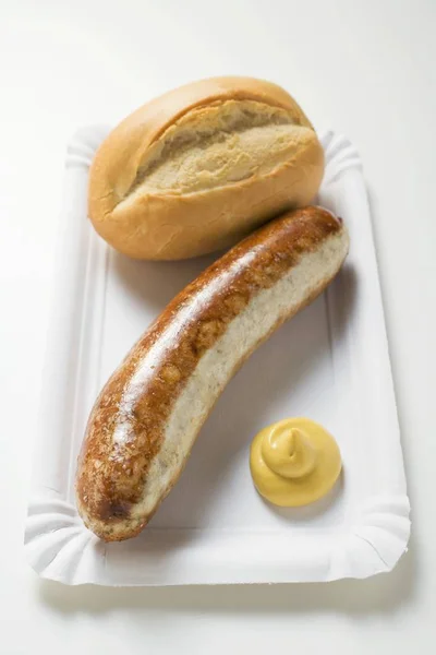 Salchicha con mostaza y rollo de baguette — Foto de Stock