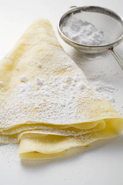 Crepe with icing sugar — Stock Photo, Image