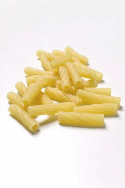 Bunch of raw rigatoni pasta — Stock Photo, Image