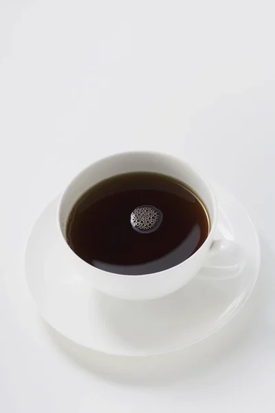 Black coffee in white cup — Stock Photo, Image