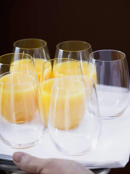 Varios vasos de jugo de naranja — Foto de Stock