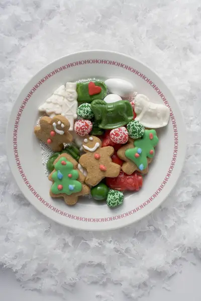 Christmas biscuits on plate — Stock Photo, Image