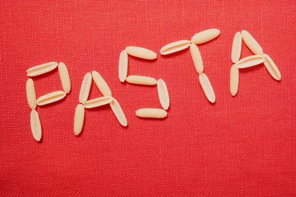 Word Pasta made of dried pasta — Stock Photo, Image