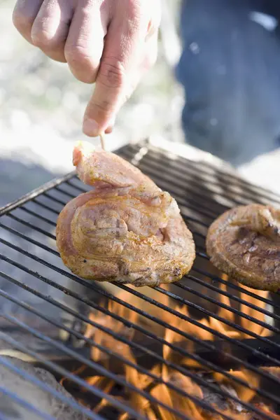 Raw Pork on barbecue grill rack — Stock Photo, Image