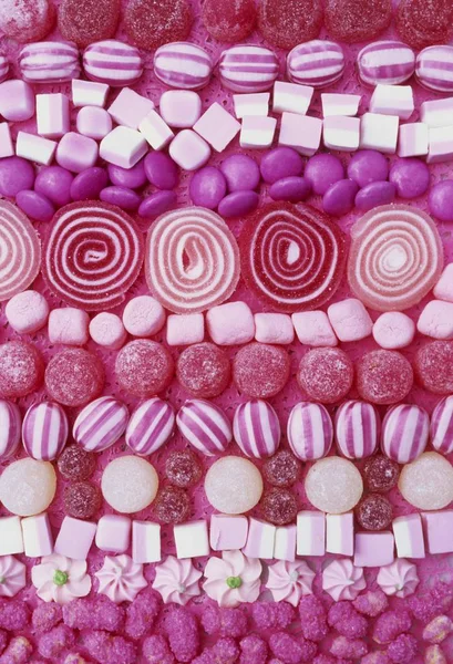 Ассорти розовые сладости — стоковое фото