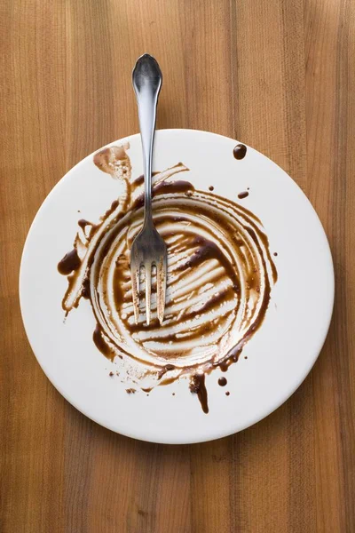 Bovenaanzicht Van Plaat Met Resten Van Chocoladesaus — Stockfoto