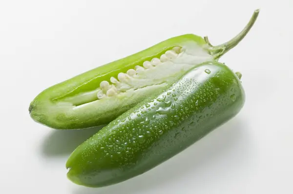 Green chilli with drops of water — Stock Photo, Image