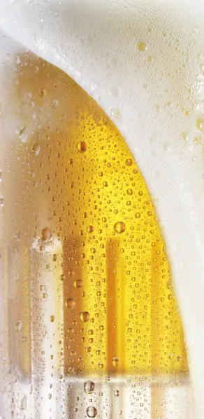 Beer foam flowing over — Stock Photo, Image