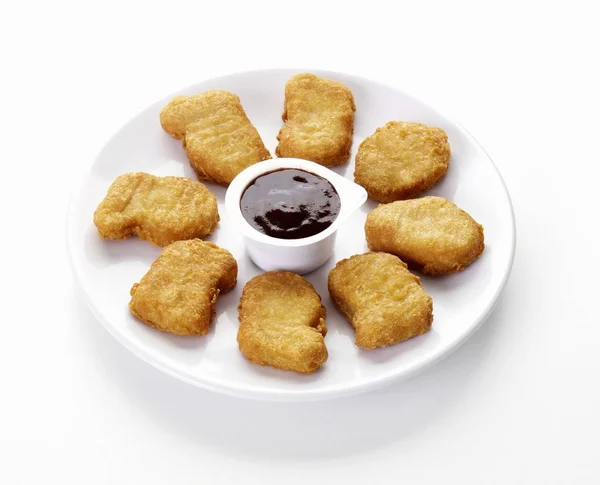 Nuggets de frango com molho — Fotografia de Stock