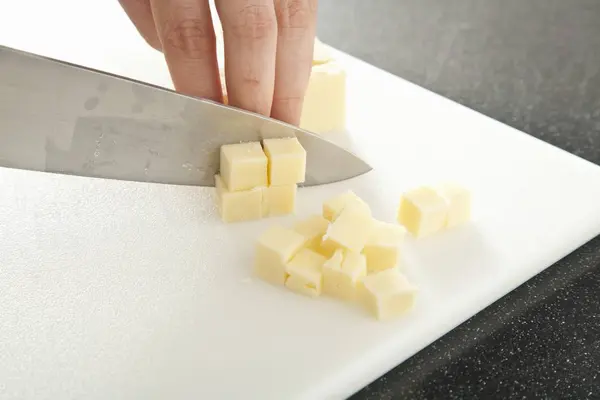 Hand Cutting Cheddar Cheese — Stock Photo, Image