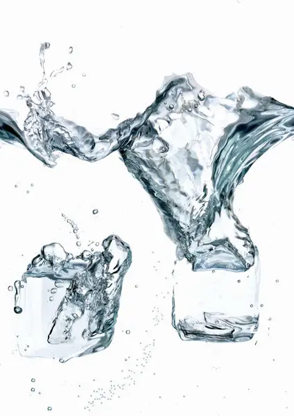 Ice Cubes Splashing into Water — Stock Photo, Image