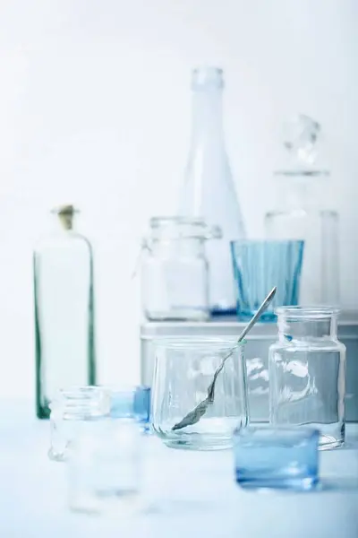 Various Empty Glasses Bottles White Background — Stock Photo, Image