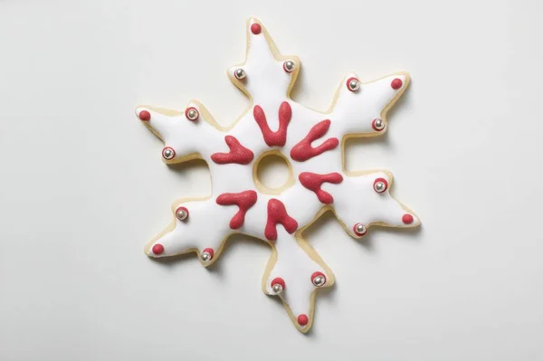 Christmas biscuit shaped like snowflake — Stock Photo, Image