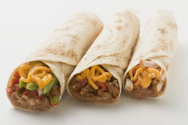 Tři různé burritos — Stock fotografie