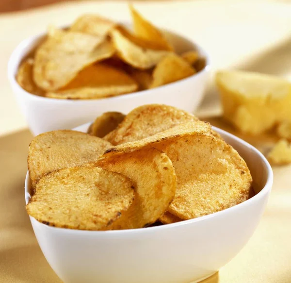 Bowls of cheesy potato chips — Stock Photo, Image