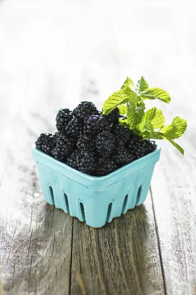 Blackberries in cardboard container — Stock Photo, Image