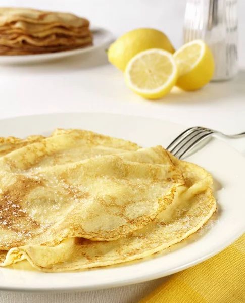 Pancakes with lemon and sugar — Stock Photo, Image