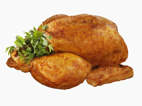 Whole roast chicken with parsley — Stock Photo, Image