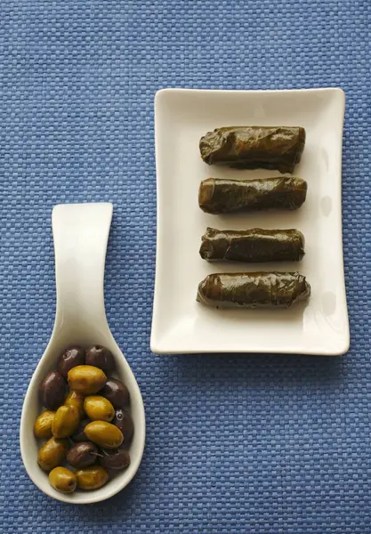 Stuffed Vine Leaves Plate Olives Spoon Blue Surface — Stock Photo, Image