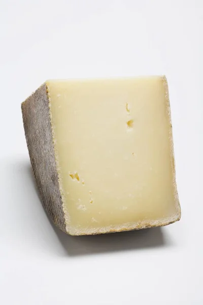 Piece of Manchego cheese — Stock Photo, Image