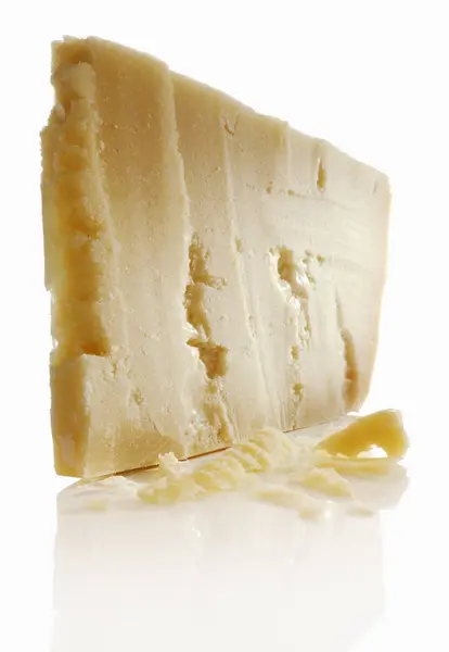 Plátek sýr Grana Padano — Stock fotografie