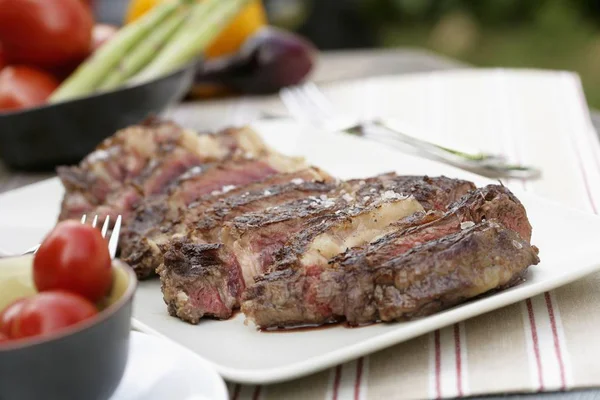 Sliced grilled beef steak — Stock Photo, Image