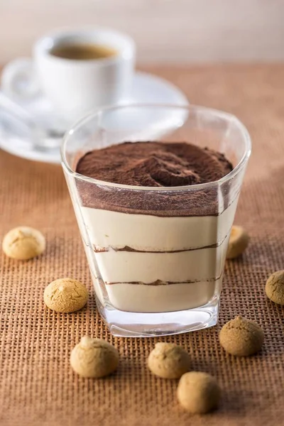 Tiramisu and amaretti in glass — Stock Photo, Image