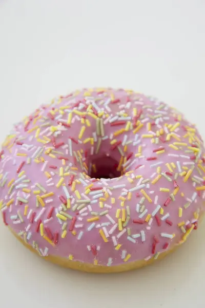 Pink iced doughnut — Stock Photo, Image