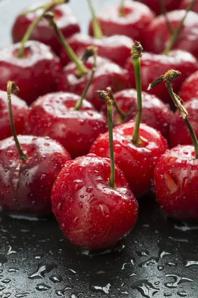 Fresh cherries with drops of water — Stock Photo, Image