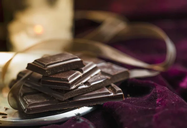 Arrangement of dark chocolate — Stock Photo, Image