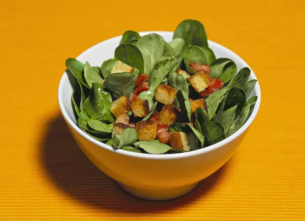 Corn salad with croutons — Stock Photo, Image