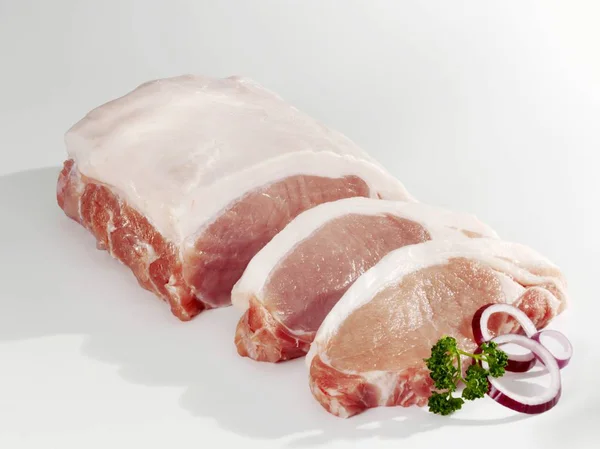 Partly sliced raw Loin of pork — Stock Photo, Image