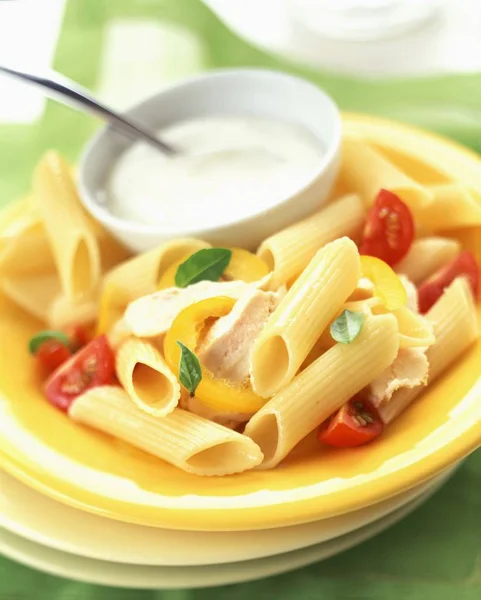 Penne pasta with chicken — Stock Photo, Image