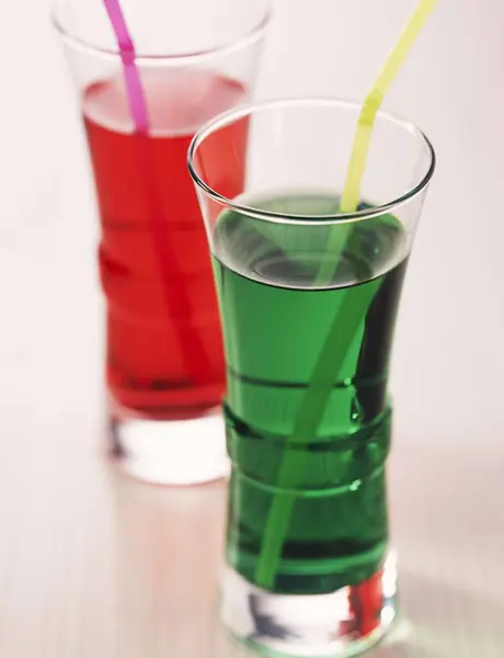 Cordial drinks in small glasses — Stock Photo, Image