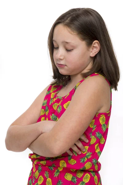 Young unhappy girl on a white background. — Stock Photo, Image