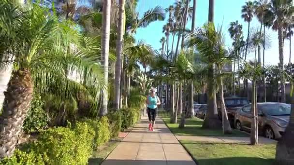 Twee video's van vrouw tijdens het joggen in 4k — Stockvideo