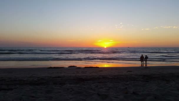 Dos vídeos de puesta de sol en la playa — Vídeos de Stock