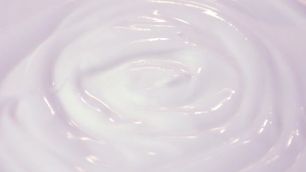 Loopbare video van wervelende yoghurt in 4k — Stockvideo