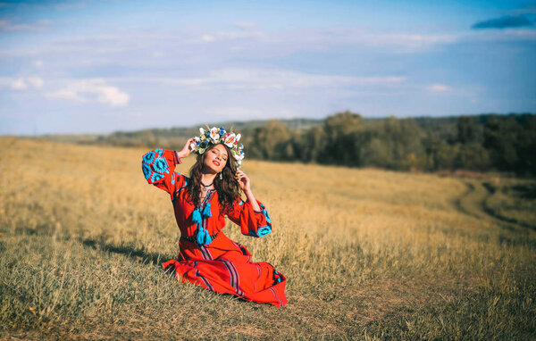 A young girl in ethnic dress