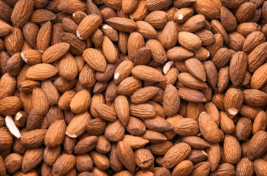 Badem yakın çekim üstten görünüm. Arka plan, doku.