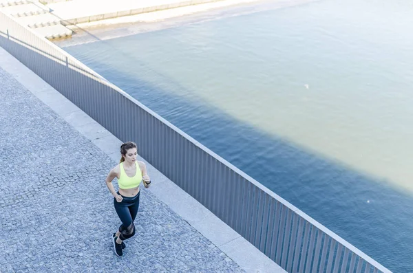 healthy happy woman jogging running outdoor listening music