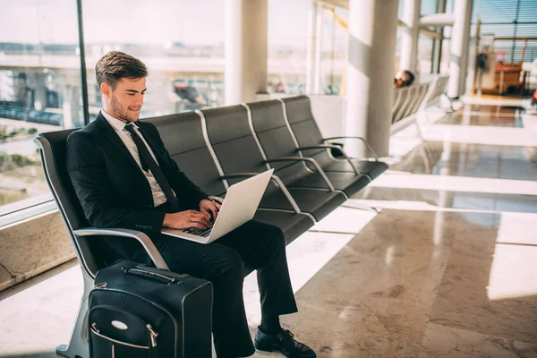 Young Business Man Sitting Computer Suitcase Airport Waiting Flight — Stock Photo, Image